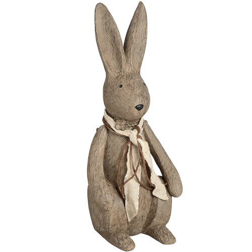 A large decorative bunny rabbit with a scarf, predominantly beige and brown in color, designed for home decor.