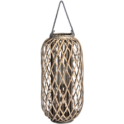 A large standing wicker lantern with an intricate weave pattern, featuring a LED candle inside, with a natural fiber construction.