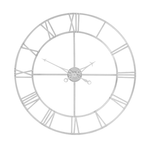 A large silver wall clock with a skeleton design, featuring Roman numerals and a center ornamental piece.