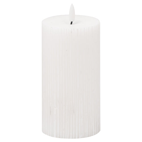 A white textured ribbed LED candle with a realistic amber LED flame.
