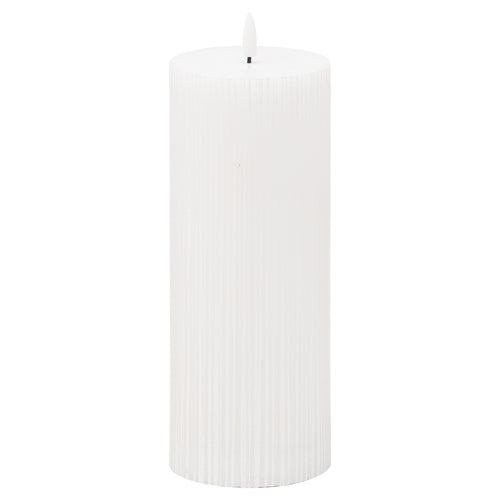 A white textured ribbed LED candle with a realistic appearance, designed for indoor use as an ambient light source.