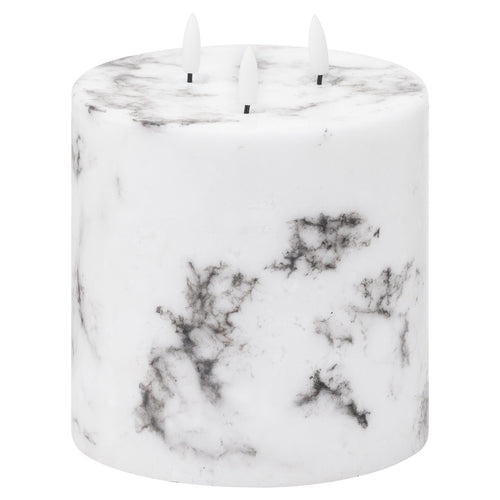 A three-wick decorative candle with a marble-effect finish and LED flames