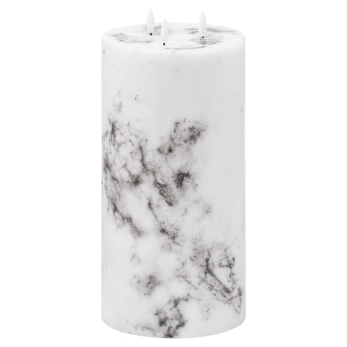 A cylindrical white marble-effect LED candle with a natural glow.