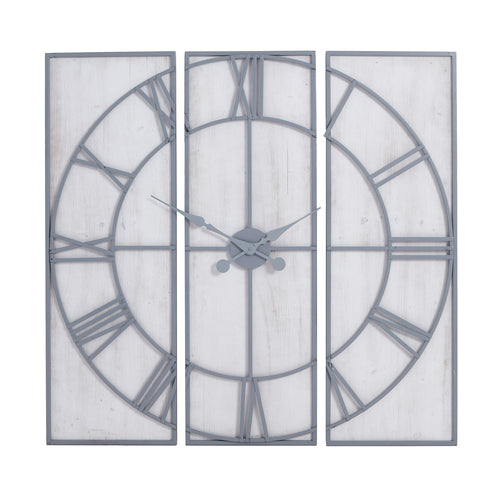 A large, panelled wall clock with a black frame and Roman numerals, divided into three vertical sections.