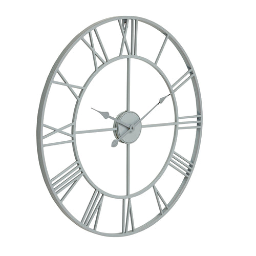 An oversized skeleton wall clock with a grey metal frame and Roman numerals.