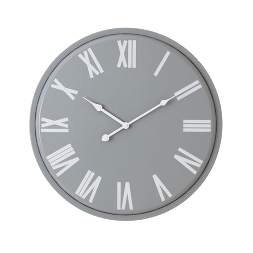 A wall clock with a light grey face, white Roman numerals, and white clock hands.