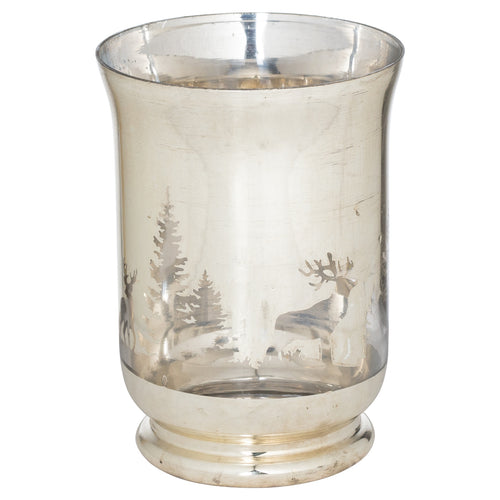 A silver candle holder with a forest and deer motif from The Noel Collection.