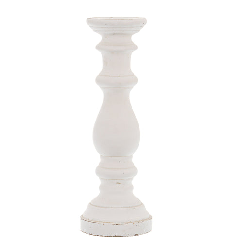 A tall cylindrical ceramic candle holder with a matte white finish.
