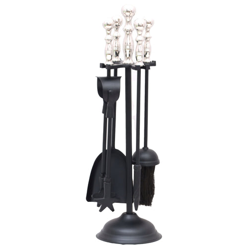 A set of fireplace tools with black handles and a chrome finish, displayed on a stand.