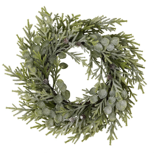 A round wreath made of frosted pine and eucalyptus leaves, with a realistic appearance, designed for indoor use.
