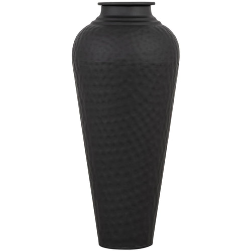 A tall, matt black, hammered steel vase with a narrow base and neck, and a removable lid.