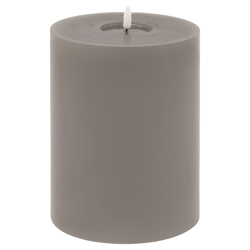 A cylindrical grey LED wax candle with a melt effect surface.