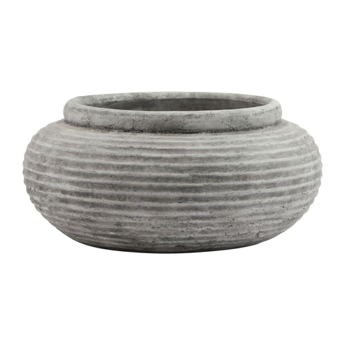 A gray round ribbed planter suitable for artificial or live botanicals.