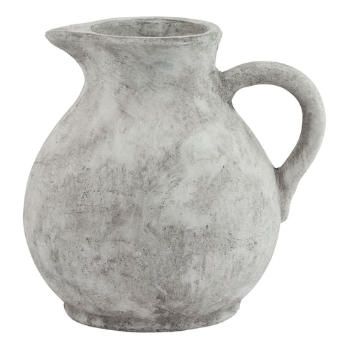 A gray concrete Athena jug with a terracotta-inspired design, featuring a gracefully curved silhouette and a handle.