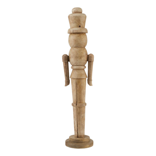 A large decorative nutcracker figure with a natural wood finish.