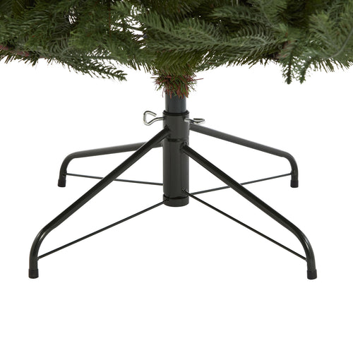 Black metal Christmas tree stand with a green artificial tree on a white background