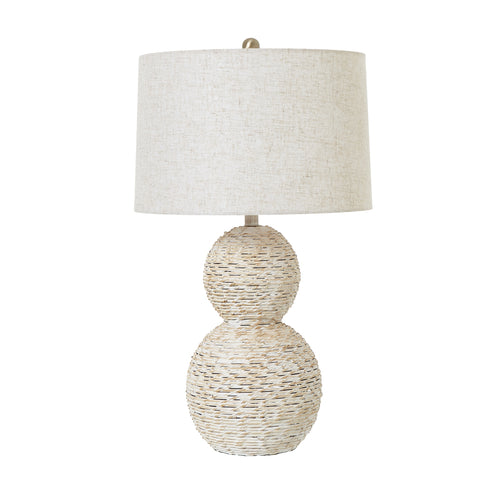 A white wash wicker globe table lamp with a linen shade, showing a double-orb silhouette design.