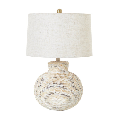 A bulbous wicker table lamp with a linen shade, featuring a white-wash finish.