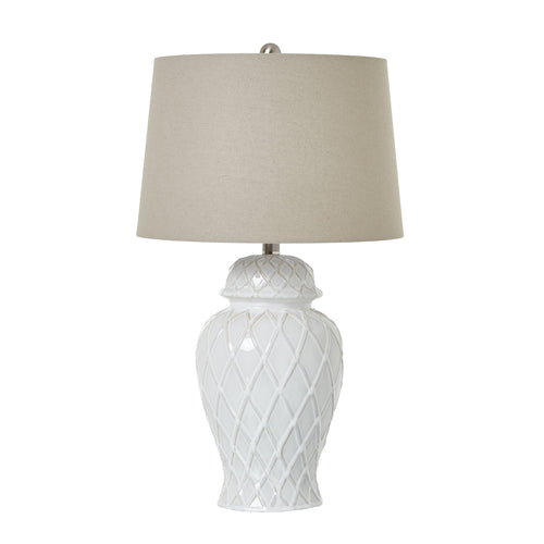 A white ceramic ginger jar lamp with a beige linen shade, displaying a textured diamond pattern on the base.