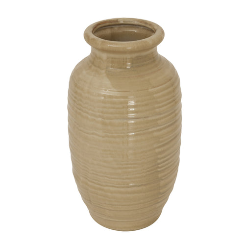 A beige tall fluted vase from the Sabbia Collection with a matte finish.