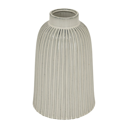A white, bell-shaped, ceramic Monte vase with vertical ridges, displayed against a plain background.