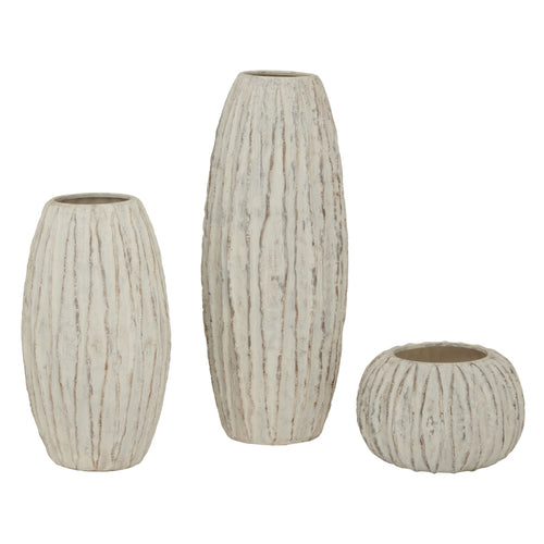 A picture of 3 beige ceramic vases with a geometric pattern and a ribbed texture, standing on a flat surface.
