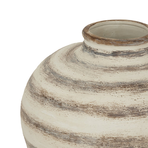 A close u of a large, ceramic amfora vase top with a striped pattern in beige and brown tones
