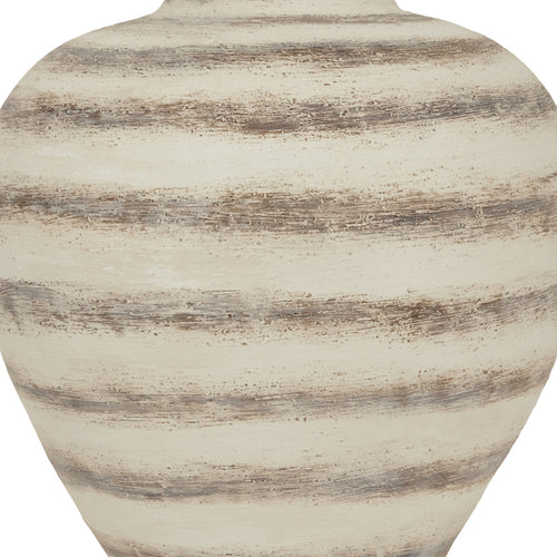 A close u of a large, ceramic amfora vase with a striped pattern in beige and brown tones