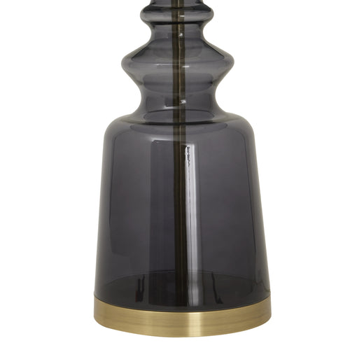 The bottom view of a  Luxton glass urn lamp with a black velvet shade and gold accents on the finial and base.