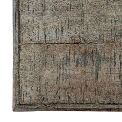 Textured brown and gray patterned rug on a white background