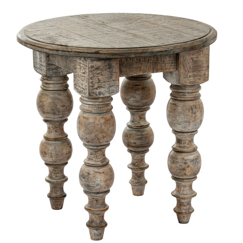 Round wooden table with turned legs on a white background