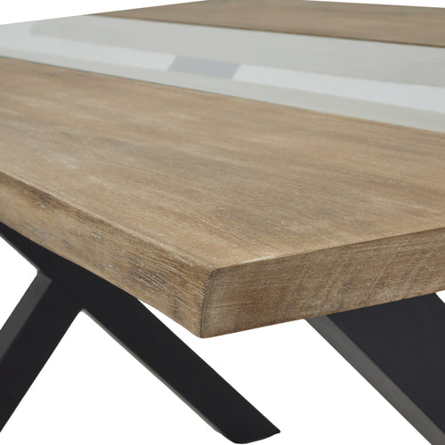 Wooden table with black metal legs on a white background