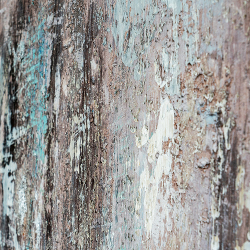 Close-up of textured surface with peeling paint