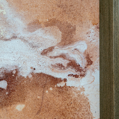 Close-up of a textured surface with brown and white colors