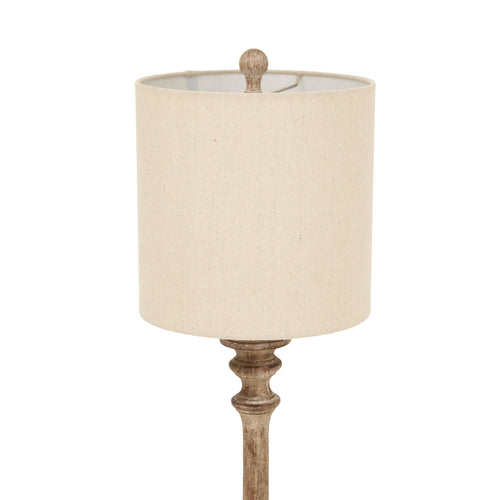 Beige lamp with wooden base on a white background