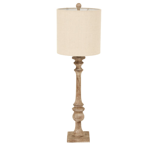 Table lamp with beige shade and wooden base on a white background