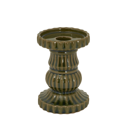 Green ceramic candle holder on a white background