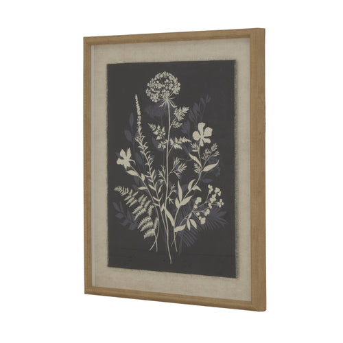 A framed artwork featuring a meadow scene on natural linen with beaded frame detailing.