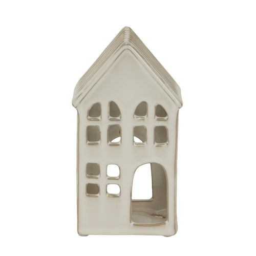 Ceramic house-shaped lantern on a white background