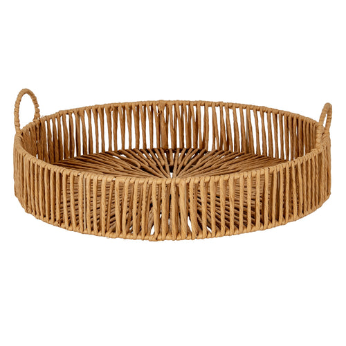 Woven rattan basket with handles on a white background