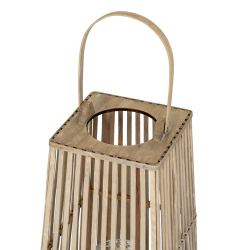 Close up of Wooden lantern with a handle on a white background