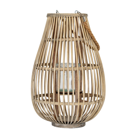 Woven rattan lantern on a white background