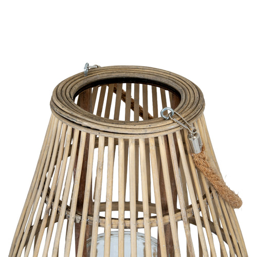 Wicker lampshade with a rope handle on a white background