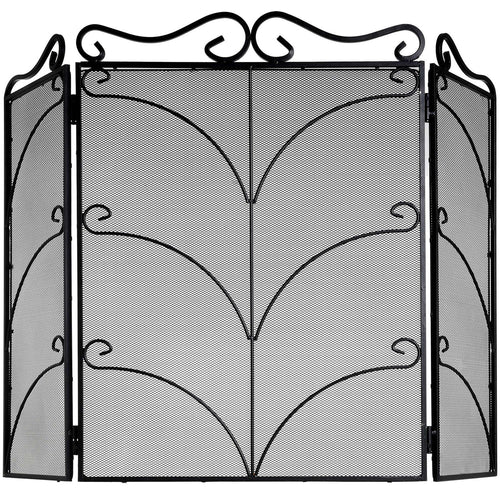 A heavy large black ornate fire screen with intricate designs, folded into three panels.