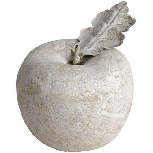 Decorative stone apple with a leaf on a white background