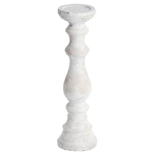 A tall, cylindrical, stone candle holder with a textured surface and a wide base.
