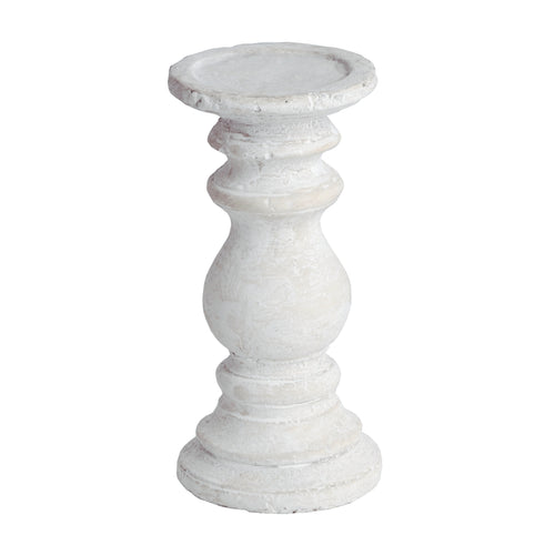A white stone-effect candle holder with detailed texturing, designed for holding candles, with a weathered appearance.
